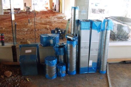Multiple ducts stacked and with duct protective film.