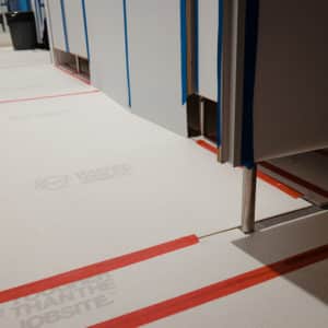 white alpha shield corrugated plastic sheeting protecting floors on a job site